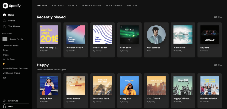 A screenshot of Spotify's page, in dark mode with the album and artist image in color and the text is white. 