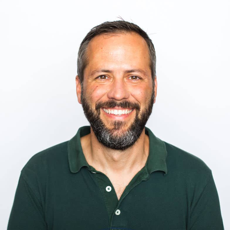 Headshot of Mike P., Remote Happiness Engineer