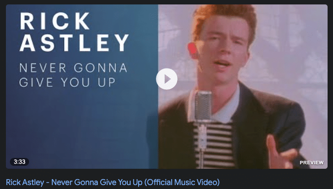 Screenshot of the preview image for Rick Astley's smash hit "Never Gonna Give You Up" with a triangular play icon in the middle