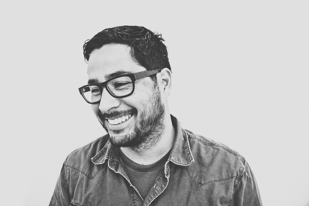 Black and white portrait photo of Bryan Monzon