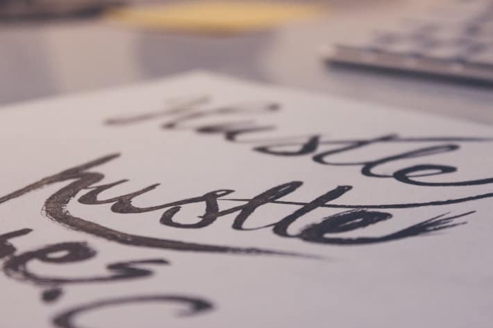 calligraphy that spells out the word Hustle in multiple styles