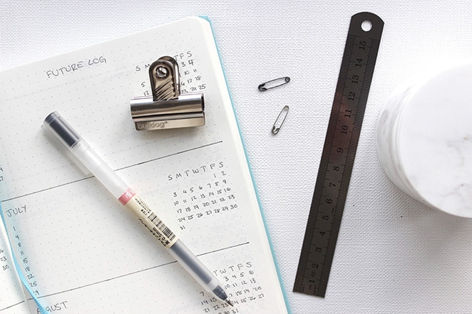 calendar with pen and paper clips