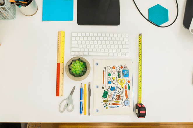 image of tools rulers keyboard and plant aligned to show wordpress sidebar on desk with other books and technology